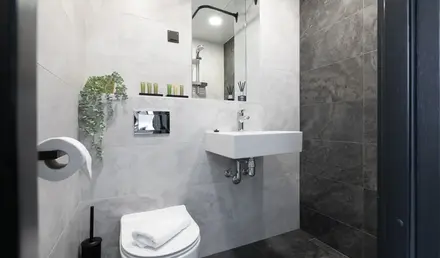 a bathroom with a sink and mirror