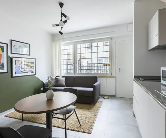 a living room with a couch and a table