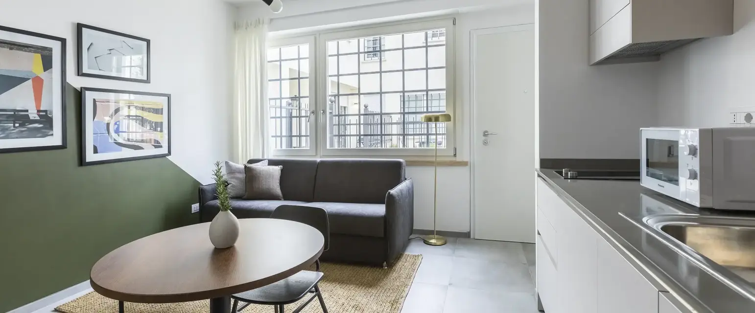 a living room with a couch and a table