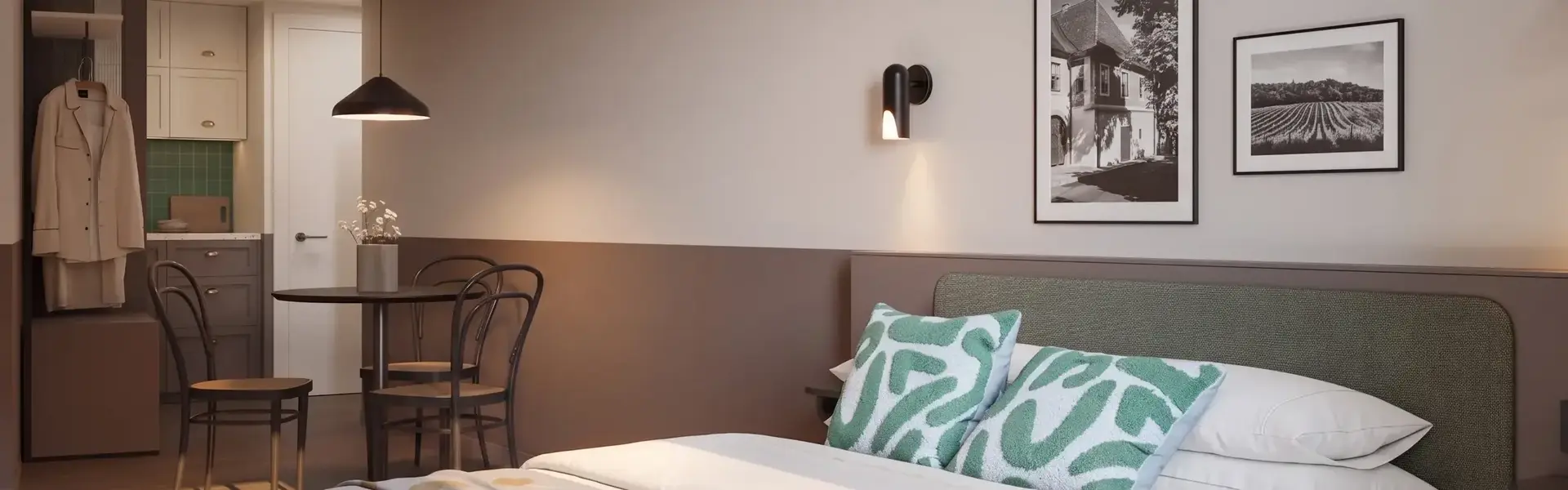 a bed with a table and chairs