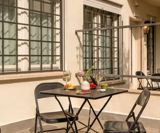 a table and chairs on a patio