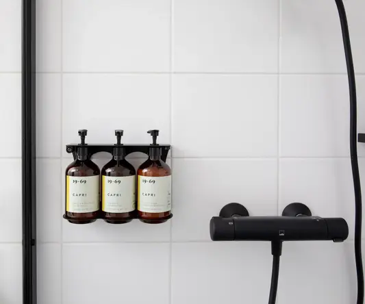 a group of bottles on a wall