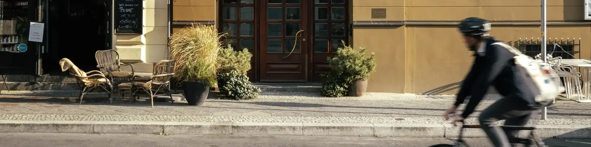 a person riding a bicycle on the street