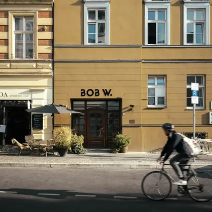 a person riding a bicycle on the street