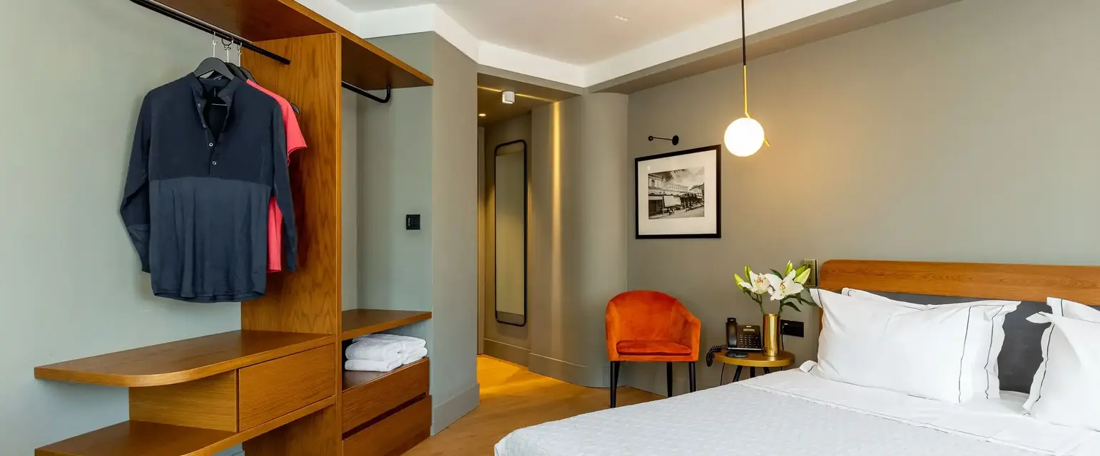 a bedroom with a bed and a closet