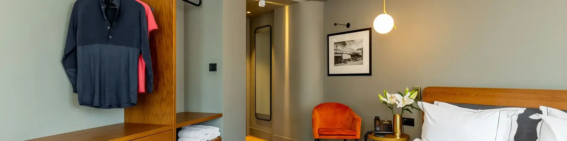 a bedroom with a bed and a closet