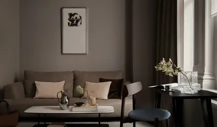 a living room with a couch and coffee table