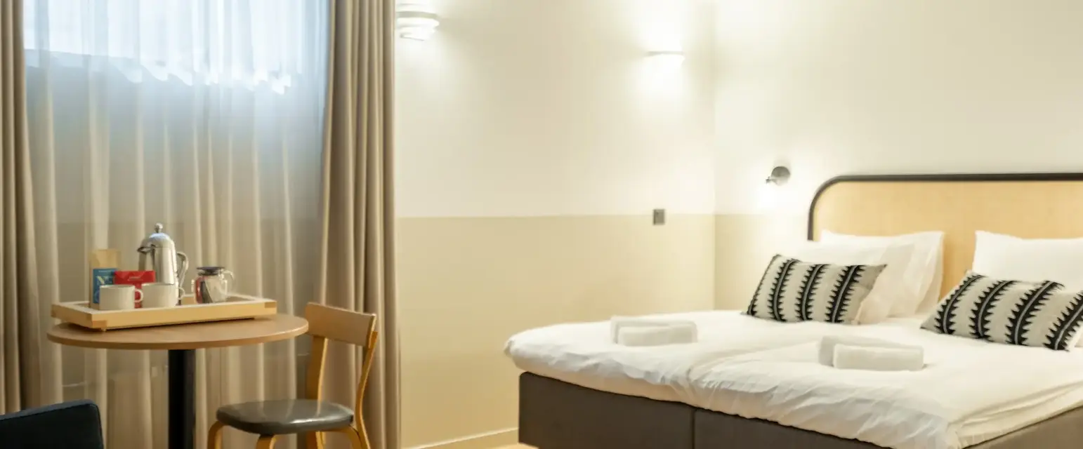 a room with a bed and a table