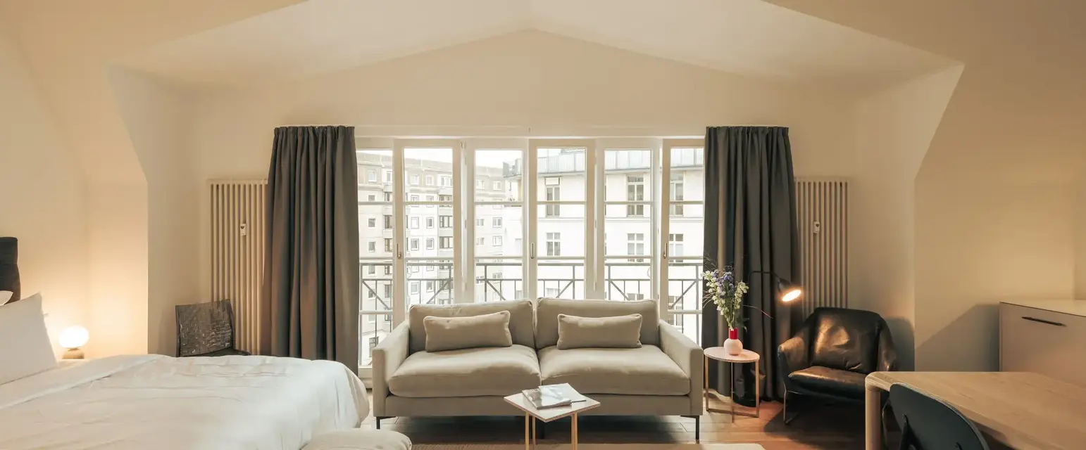 a room with a bed and a couch