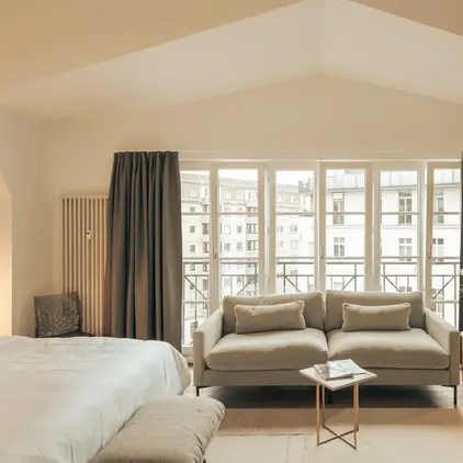 a room with a bed and a couch