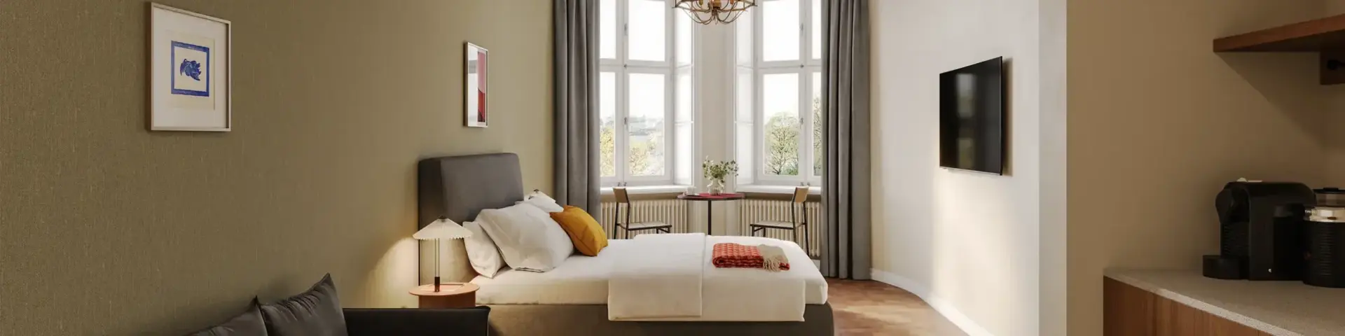 a bedroom with a bed and a couch