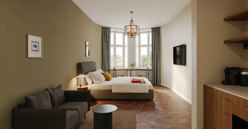 a bedroom with a bed and a couch