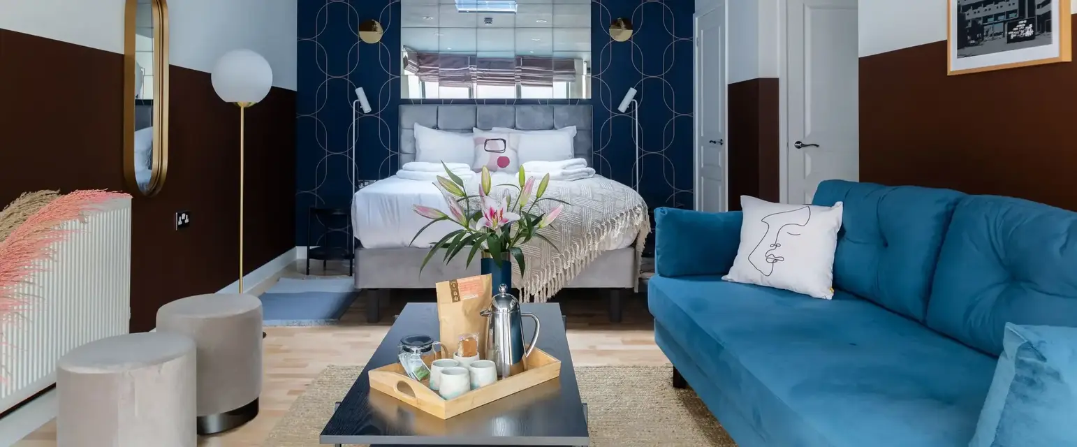 a room with a bed and a couch