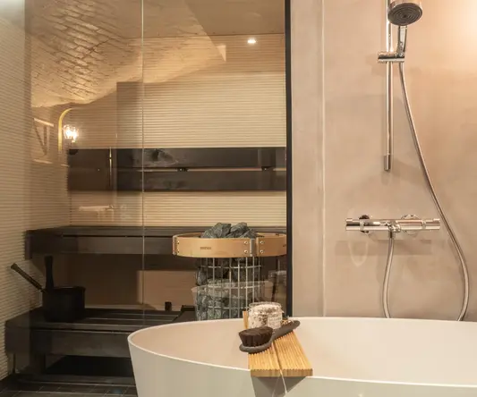 a bathtub and shower in a bathroom
