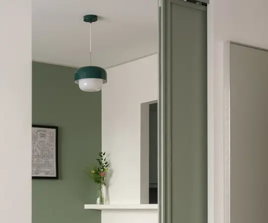 a room with a table and chairs