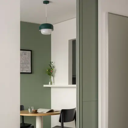 a room with a table and chairs