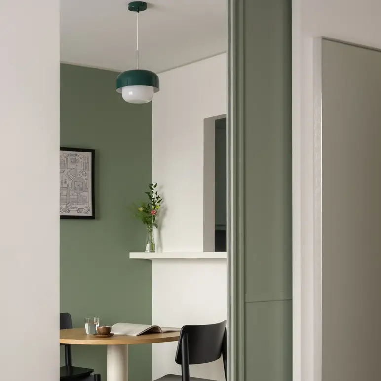 a room with a table and chairs