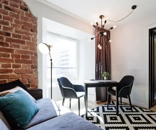 a living room with a couch and a table