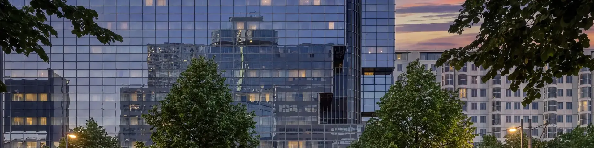 a building with trees in front of it
