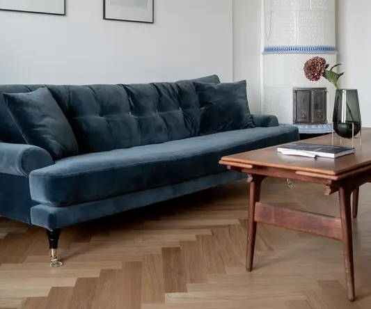 a blue couch in a room