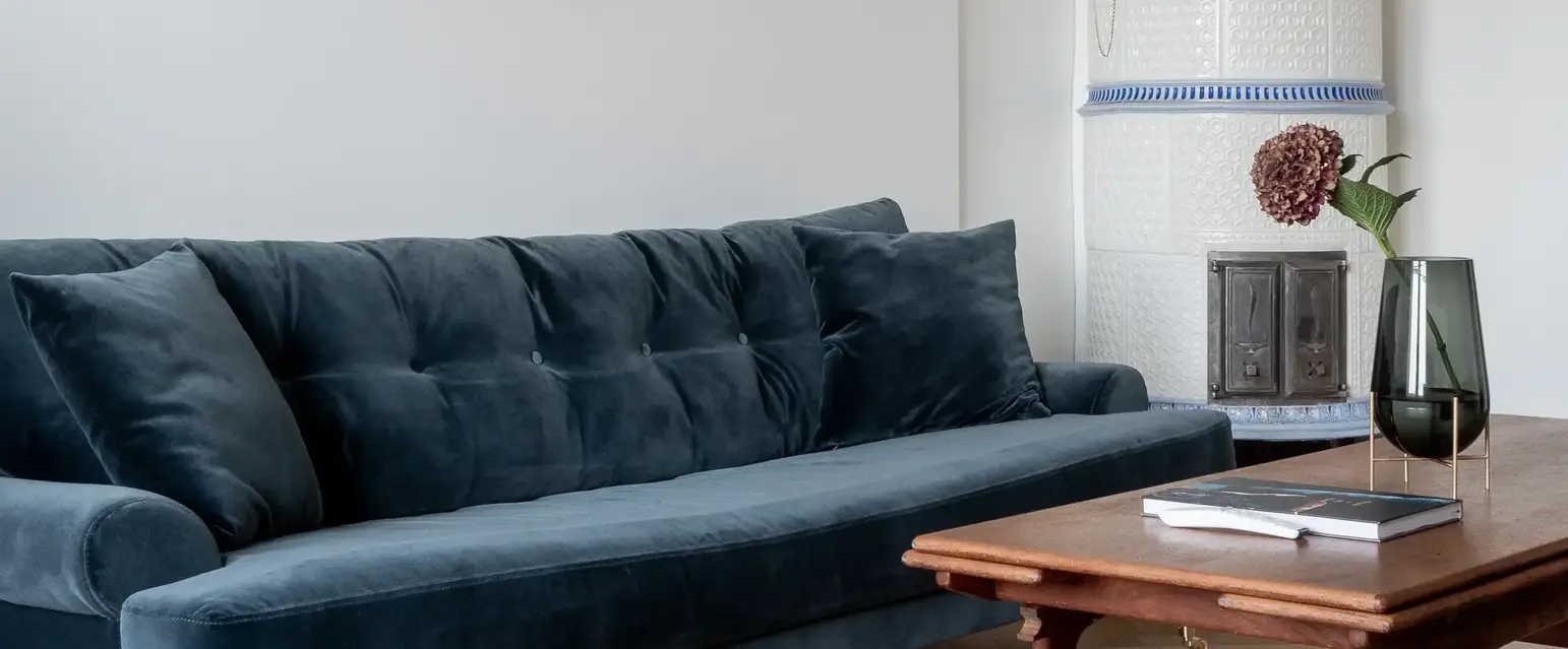 a blue couch in a room