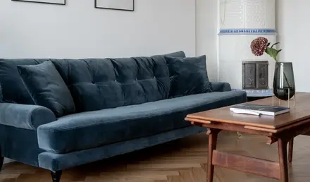 a blue couch in a room