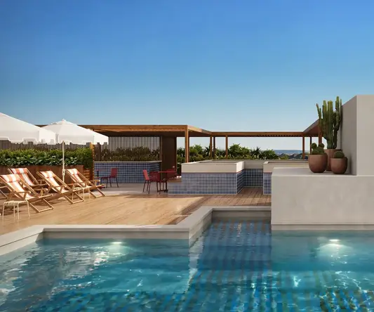 a pool with a building and a roof