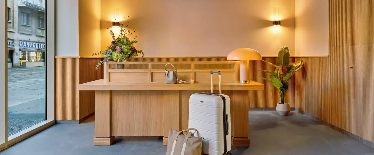 a luggage on a desk in a hotel lobby