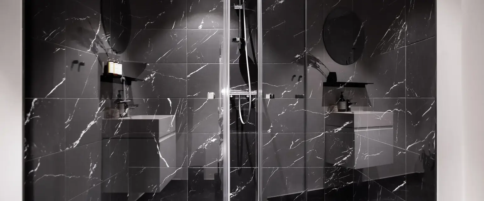 a bathroom with a glass shower