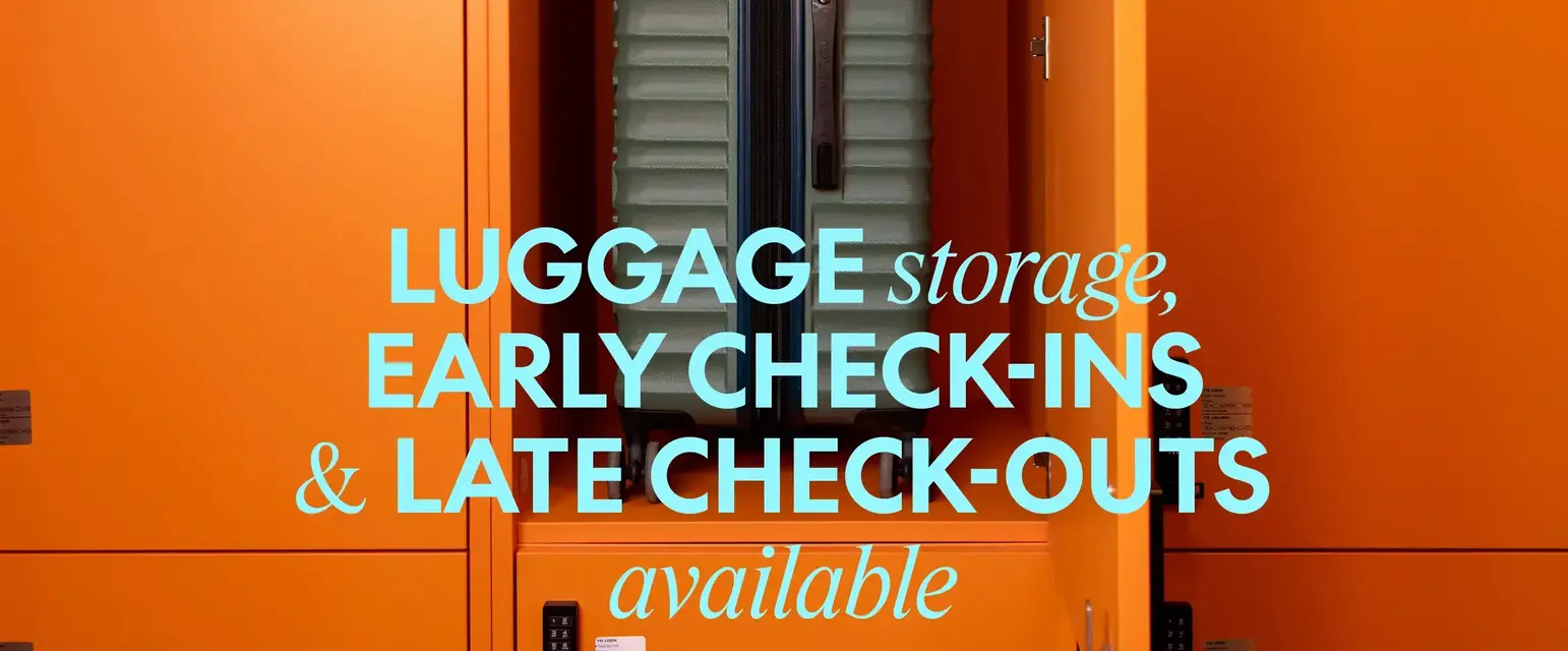 a green suitcase in an orange locker