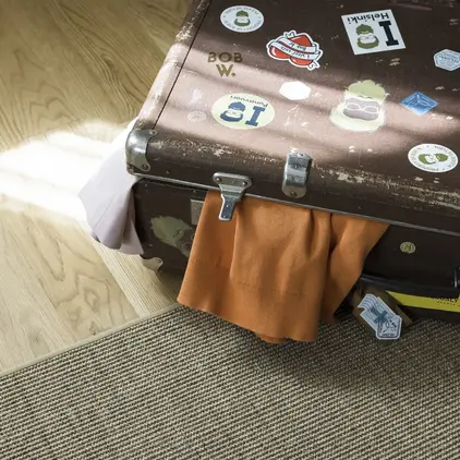 a suitcase with stickers on it