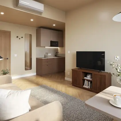 a living room with a tv and a couch