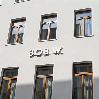 a building with windows and a sign