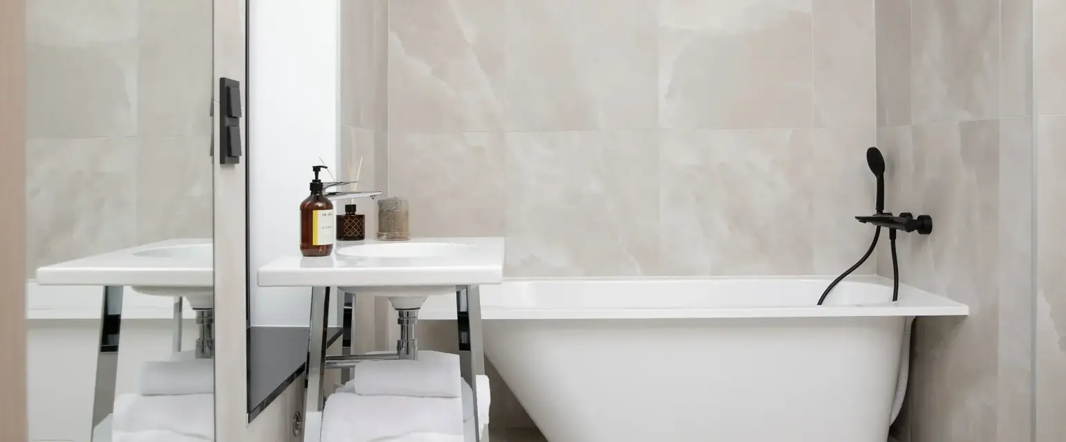 a bathroom with a sink and bathtub