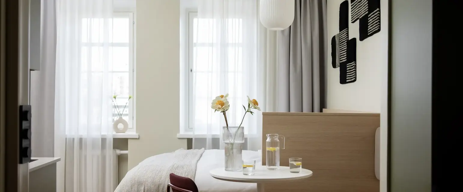 a room with a bed and a table