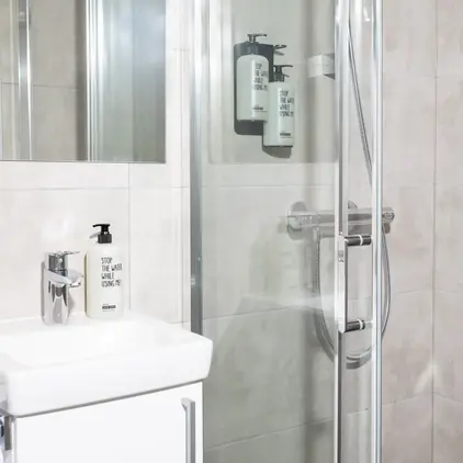 a shower with a glass door