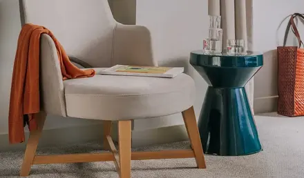 a chair next to a table