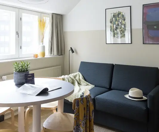 a living room with a couch and a table