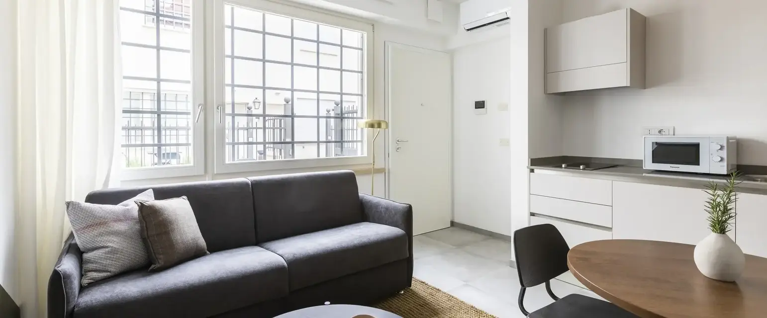 a living room with a couch and a table