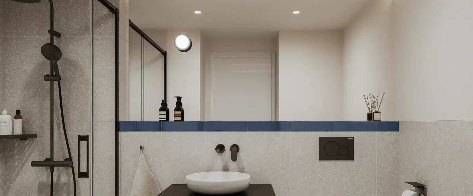 a bathroom with a shower and sink