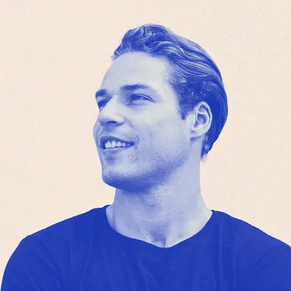 a man with a blue specks