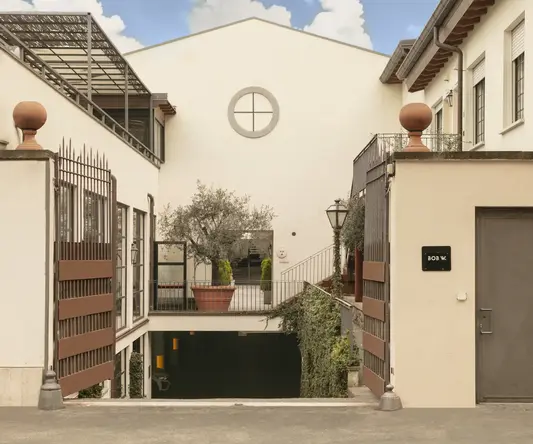 a building with a door and a garage