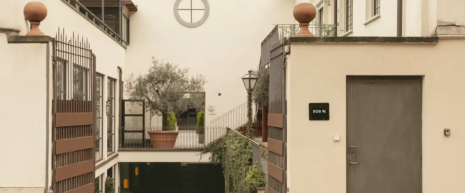 a building with a door and a garage