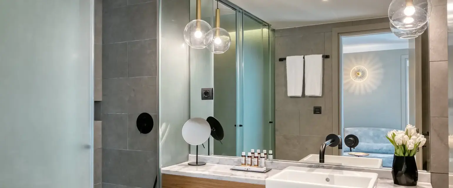 a bathroom with a sink and shower