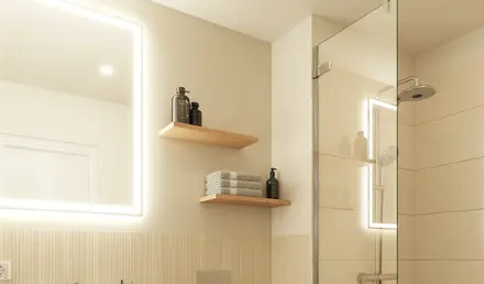 a bathroom with a glass shower and a toilet