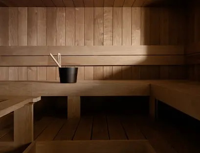 a wooden bench with a cup of chopsticks in it