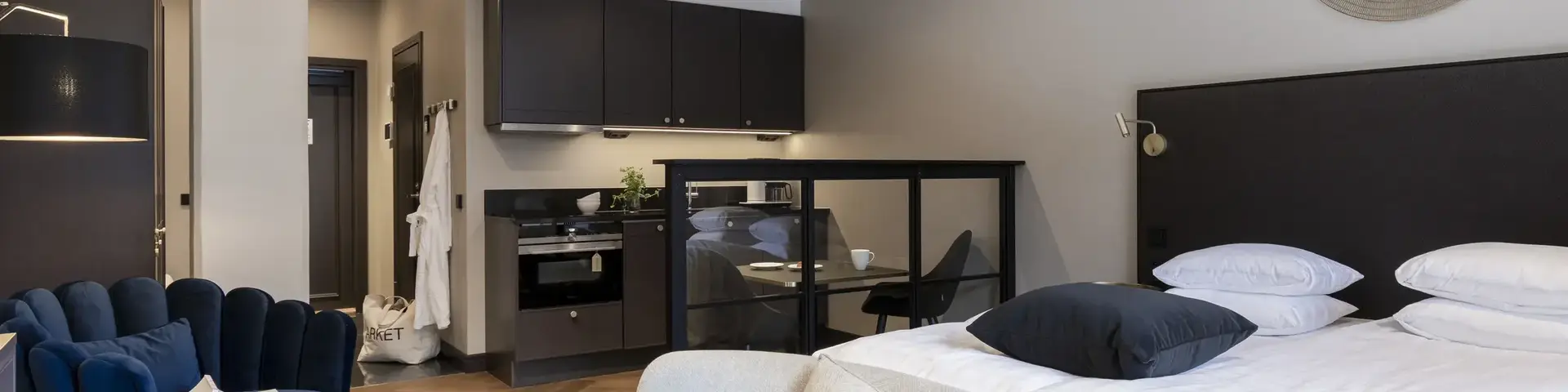 a bedroom with a bed and a chair