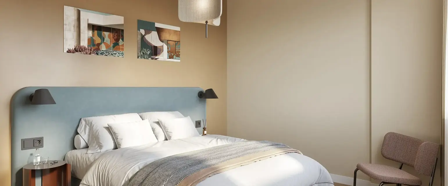a bedroom with a bed and chair