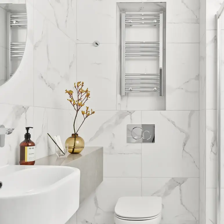 a bathroom with a sink and toilet