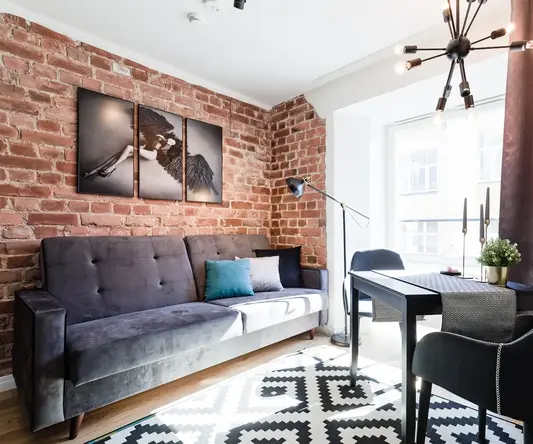 a living room with a couch and a table